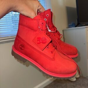 Red Timberlands new without box size 7 men size 8.5 women